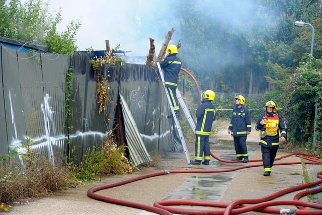 Firefighters tackle a blaze at Portsmouth Greyhound Stadium site, Target Road, Tipner, Portsmouth. 6th August 2011.Picture: Allan Hutchings 112801-911