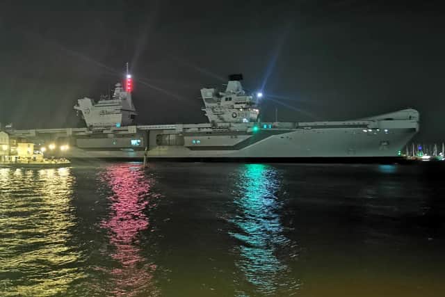 HMS Prince of Wales entering Portsmouth harbour at 3am on 20 April 2022. The carrier was returning from the exercise Cold Response off Norway during which it acted for the first time as a NATO flagship. Prince of Wales then visited Iceland before returning home. Picture: Stephen Ashton
