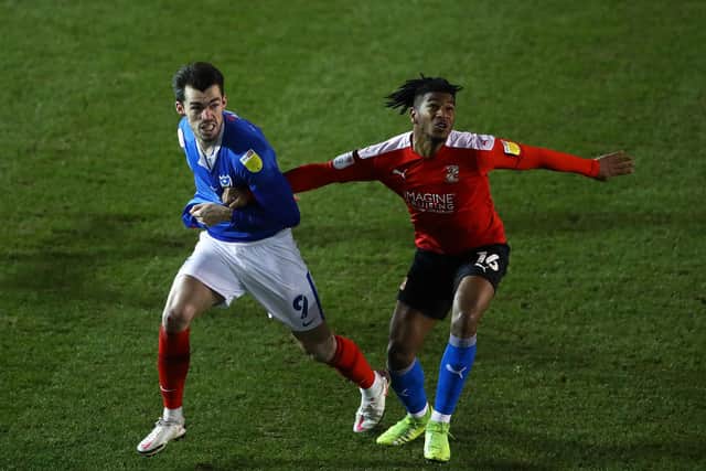 Akin Odimayo battles with John Marquis last season (Photo by Bryn Lennon/Getty Images)
