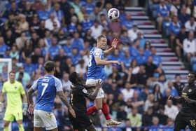 Michael Morrison in the thick of the action for Pompey against Peterborough. Picture: Jason Brown/ProSportsImages