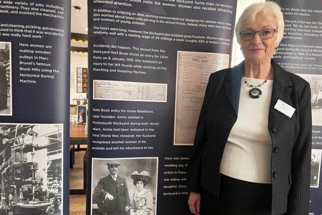 Cheryl Jewitt standing next to a photo of her grandmother, Clara Eliza Sillence on the Triangle Girl’s project information banners
Picture: Noni Needs
