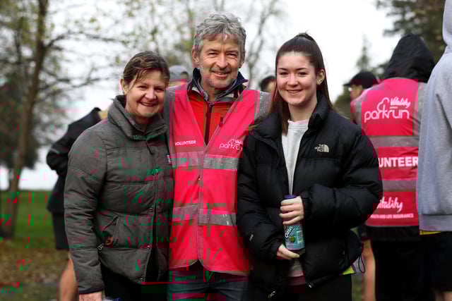 Heather Bond, left, Peter Bond, centre, and Sophie Bond are all smiles at the Havant parkrun. Picture: Sam Stephenson