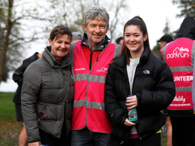 Heather Bond, left, Peter Bond, centre, and Sophie Bond are all smiles at the Havant parkrun. Picture: Sam Stephenson