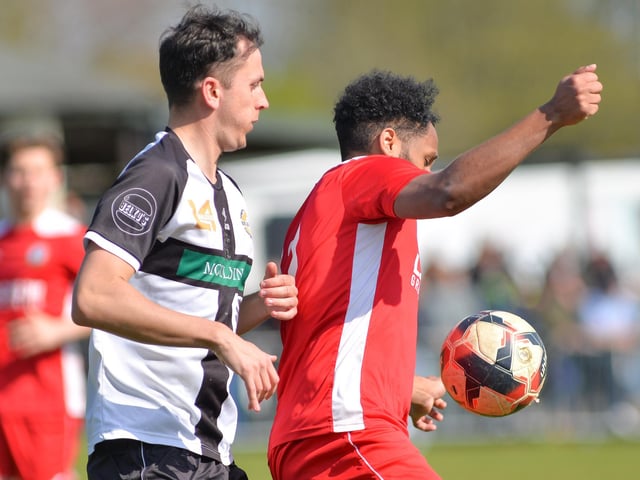 Horndean striker Rudi Blankson, right, is closely marked. Picture by Martyn White