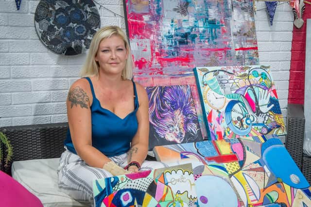 Karina Vaile with her art work. Picture: Habibur Rahman