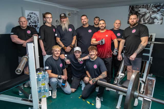 Members of the Southern Strength UK gym who took part in the chairty event. Picture: Mike Cooter (011022)
