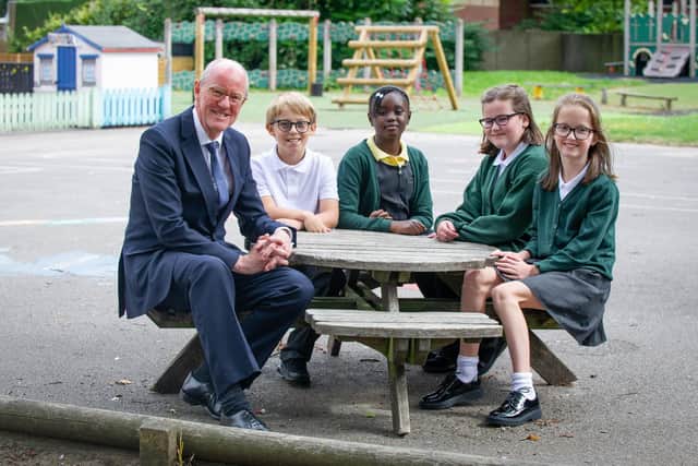 Nick Gibb talking to Gatcombe pupils, Ben Western 10, Isatou Touray 10, Lana Hurry 10 and Isla Mellish. Picture: Habibur Rahman