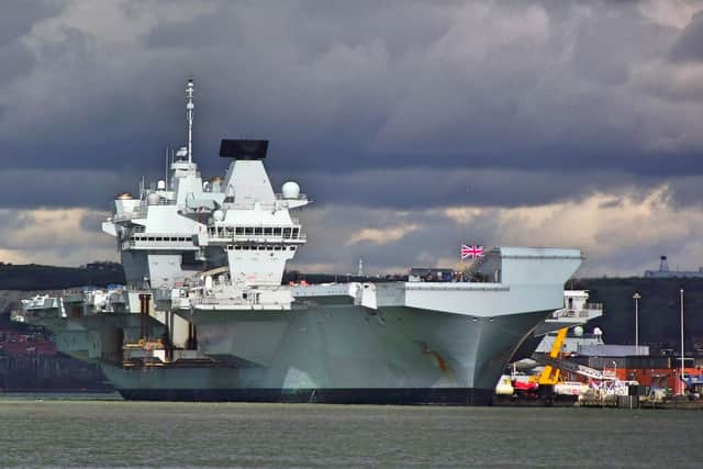 HMS Queen Elizabeth alongside Princess Royal Jetty in Portsmouth Harbour viewed from Gosport. Picture: Tony Weaver