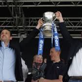 Sacha Gaydamak and Harry Redknapp hold aloft the FA Cup on Southsea Common in May 2008 following Pompey's Wembley triumph. Picture: Matt Cardy/Getty Images