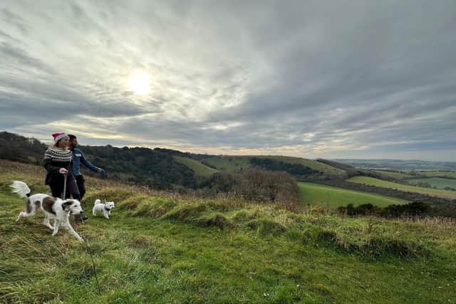 Enjoying a walk in the South Downs National Park at Christmas time. Picture by Becka Saunders