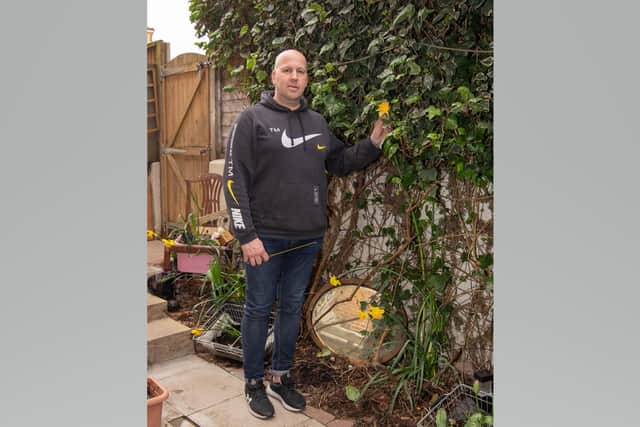 Ivan Jones has grown a daffodil which at 5ft 2in could be a world record-breaker Picture Habibur Rahman