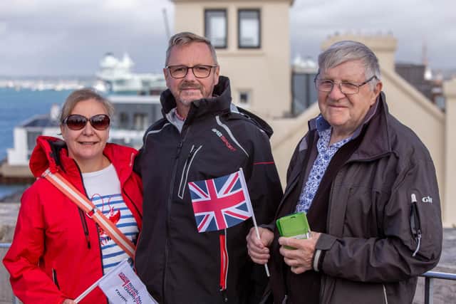 Karen Connellan, Andrew Connellan and Tony Connellan waving off Karen and Andrew's son, Edward Connellan at the Round Tower,  Old Portsmouth
Picture: Habibur Rahman