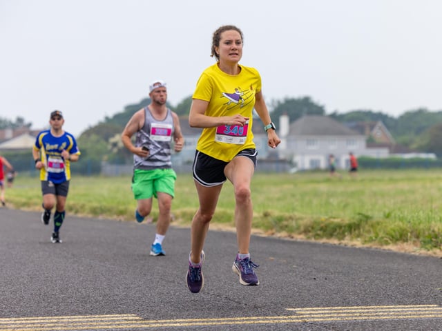 Approaching the finish line at the Run the Runway event at Solent Airport. 

Picture: Mike Cooter