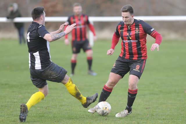 Matty Andrews, right, scored twice for Fleetlands in the Hampshire Trophy loss at Brading. Picture: Ian Hargreaves