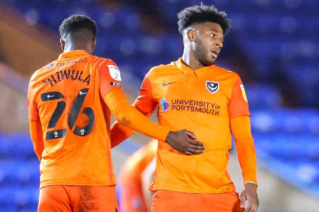 Ellis Harrison celebrates with Jordy Hiwula after his consolation goal at Peterborough. Picture: Nigel Keene