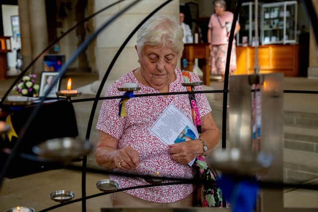 Gladys Horn, 86, lighting a candle in memory of Queen Elizabeth II at Portsmouth Cathedral
Picture: Habibur Rahman