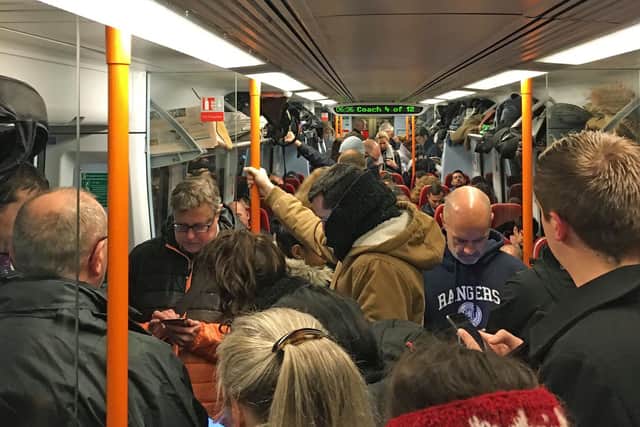 Commuters ride a crowded South Western Railway train on the Portsmouth to London Waterloo line as workers in five rail companies stage a fresh wave of strikes in the bitter disputes over the role of guards, causing disruption to services in the first full week back to work after the festive break. PRESS ASSOCIATION Photo. Picture date: Monday January 8, 2018. Members of the Rail, Maritime and Transport union (RMT) will walk out on Monday, Wednesday and Friday on South Western Railway (SWR), Arriva Rail North (Northern), Merseyrail and Greater Anglia, and on Monday on Southern. See PA story INDUSTRY Rail. Photo credit should read: Carey Tompsett/PA Wire