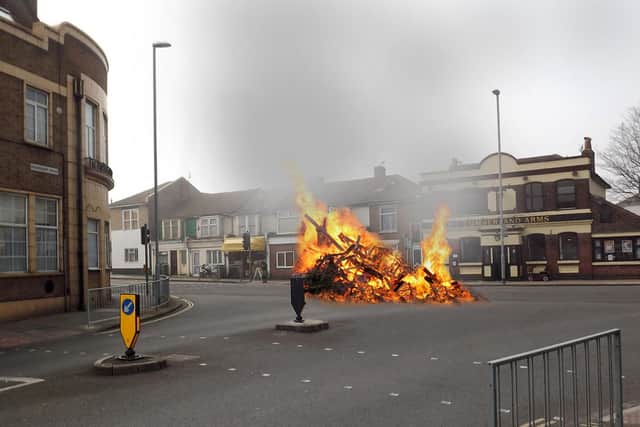 How the junction of Eastney and Bransbury Roads, Portsmouth, looked on VE Day night... after the Royal Marines had had a little fun. Picture and artwork: Bob Hind/Steve West