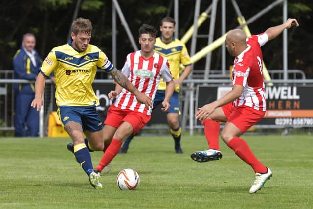 Steve Hutchings, left, has scored 217 goals for Moneyfields in 300 appearances since joining the club in 2011. Picture: Neil Marshall