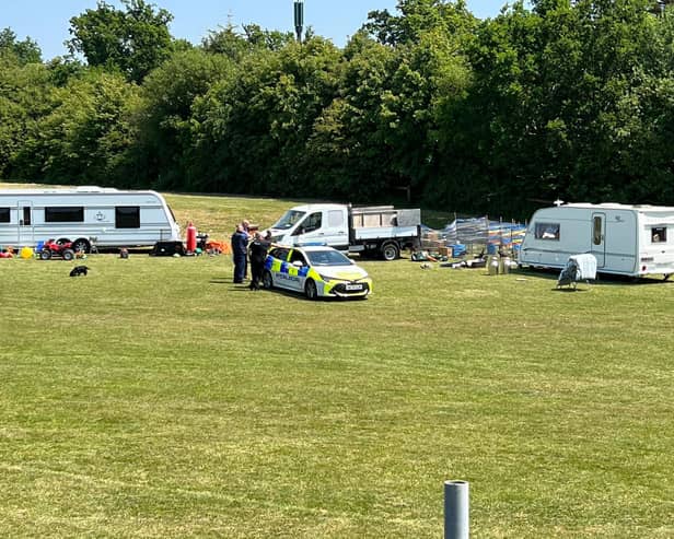 A group of travellers have set up camp on the field behind Hawks FC.