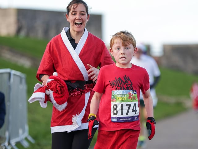 A number of runners took to the picturesque coastal route to take on the Portsmouth Coastal Waterside Marathon, Festive Half Marathon, as well as the Southsea 5k and 10k Turkey Trot. Picture: Chris  Moorhouse (221224-76)