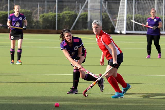 Portsmouth's women 2nds purple) v Basingstoke. Photograph by Sam Stephenson
