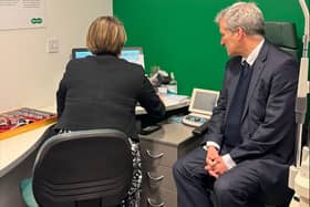 Damian Hinds MP getting his eyes tested