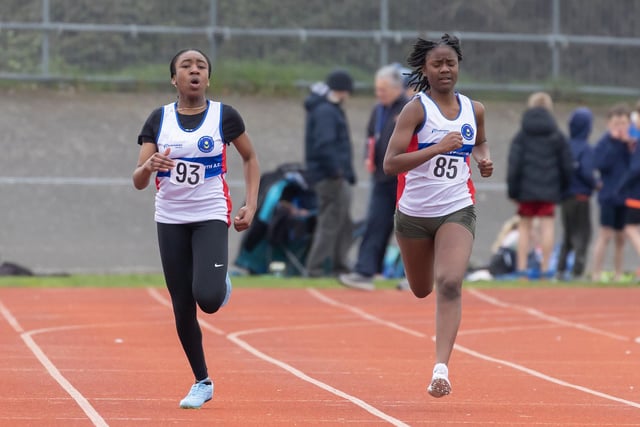Abigail Cupid (85) and Adjara Seibou in the Under-15 girls 200m heats. Picture by Paul Smith