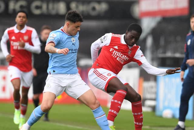 Arsenal Under-21s' Charles Sagoe Jr is challenged by Manchester City's Alex Robertson in a PL2 clash in May 2023. Picture: David Price/Arsenal FC via Getty Images