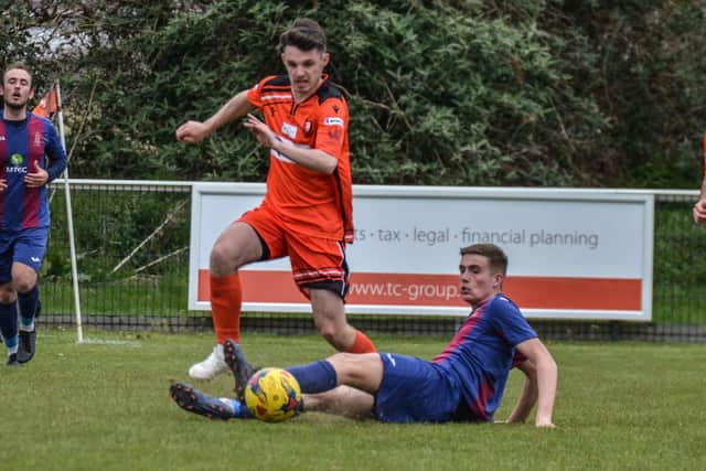 Jordan Pile (right) in action for US Portsmouth during their 4-1 friendly win at Portchester. Picture: Daniel Haswell.