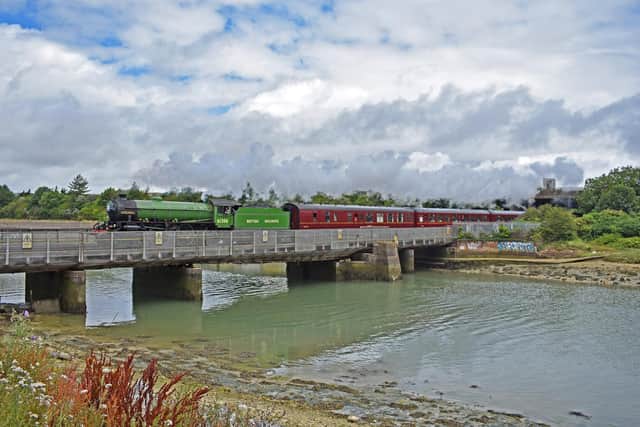 A Steam Dreams excursion to Portsmouth from Waterloo crossing Portcreek in 2019, by Graham Stevens of Portchester.