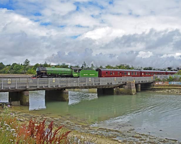 A Steam Dreams excursion to Portsmouth from Waterloo crossing Portcreek in 2019, by Graham Stevens of Portchester.