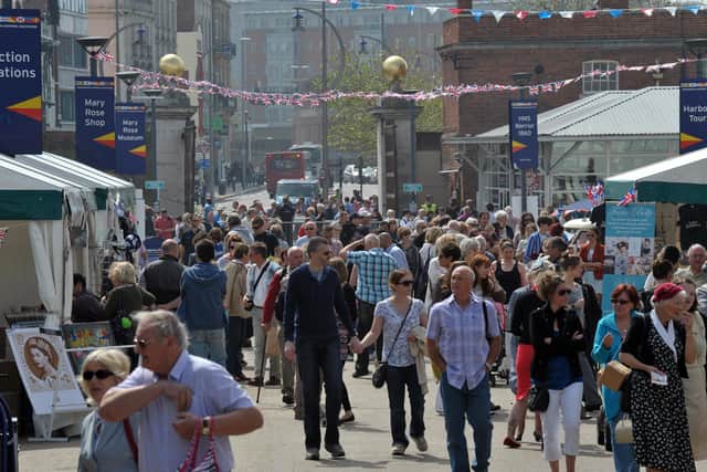 Visitors arriving at Victorious Vintage at Portsmouth Historic Dockyard in 2012  (121916-663)