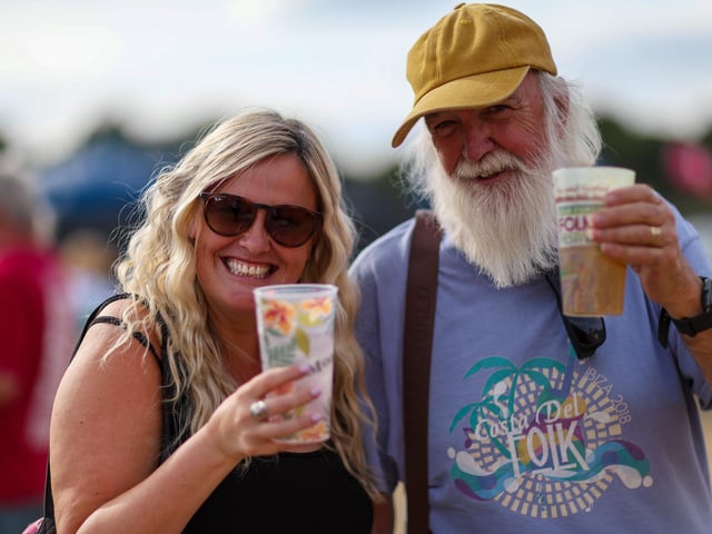 Hannah Diment and her father, Johnny Whalley. Saturday afternoon at Wickham FestivalPicture: Chris Moorhouse (010826-35)