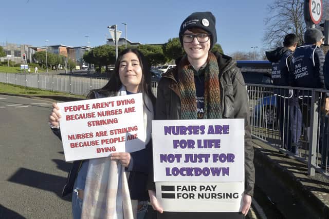 Nurses on strike at the picket line oustide QA hospital on February 6, 2023.
(l-r) Evelyn Jimenez, nursing associate and Laura McKay, nurse