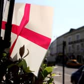 A flag adorns a home for St George's Day See PA Story  Photo credit should read: Steve Parsons/PA Wire