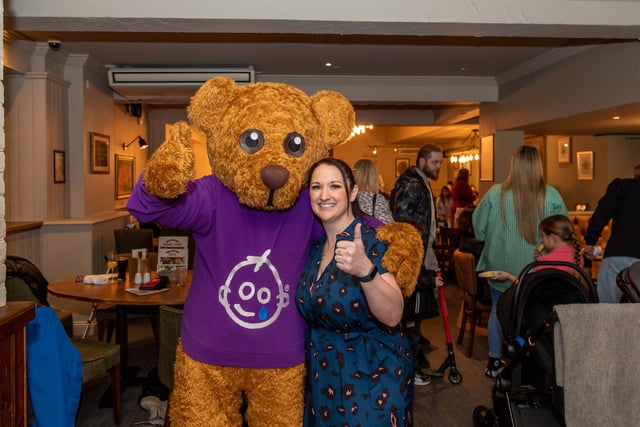General Manager of the Brewers Fayre Kelly Windebank (37) with Bernard the Bear from G.O.S.H., the nominated charity for which Whitbread have raised nearly £20 million over the last 10 years. Picture: Mike Cooter (040323)