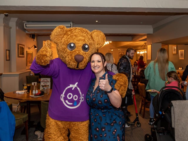 General Manager of the Brewers Fayre Kelly Windebank (37) with Bernard the Bear from G.O.S.H., the nominated charity for which Whitbread have raised nearly £20 million over the last 10 years. Picture: Mike Cooter (040323)