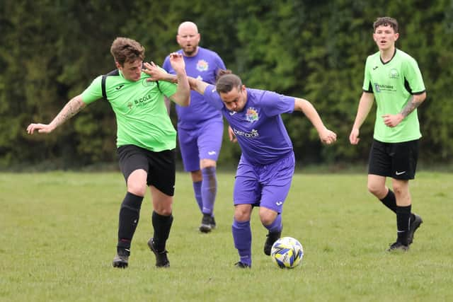 Action from the City of Portsmouth Sunday League Division Four match between AFC Bedhampton Village reserves and Friends Fighting Cancer (purple kit). Picture: Kevin Shipp