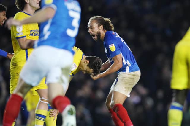 Marcus Harness celebrates his 89th-minute winner