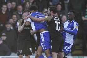 Joe Morrell being 'headbutted' by Jarell Quansah.