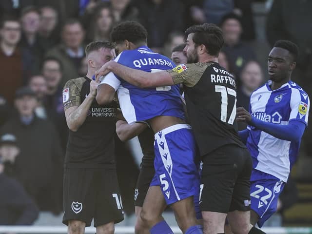 Joe Morrell being 'headbutted' by Jarell Quansah.