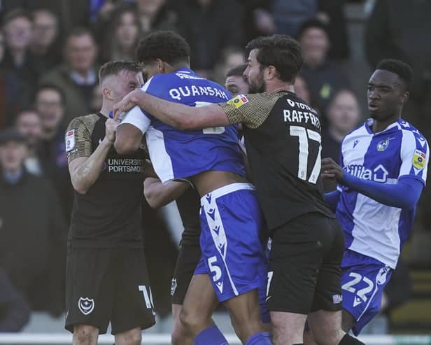 Joe Morrell being 'headbutted' by Jarell Quansah.
