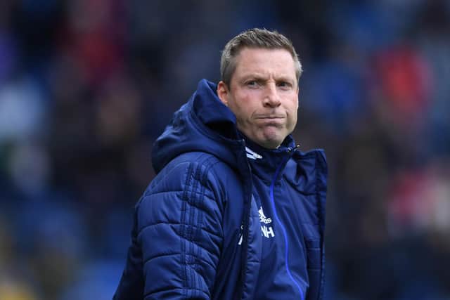 Neil Harris was linked with the Pompey job last March but has since joined Gillingham.