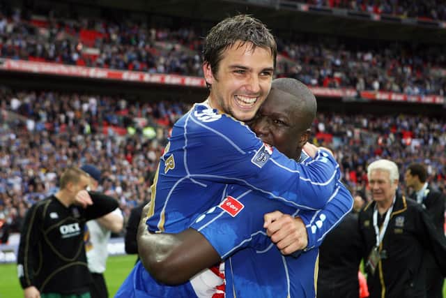 Niko Kranjcar celebrates with team-mate Papa Bouba Diop following Pompey's FA Cup final win in 2008. Picture: Joe Pepler