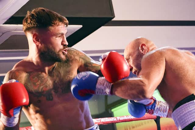Joel McIntyre, left, in battle with Nikita Basin. Picture: Barry Zee