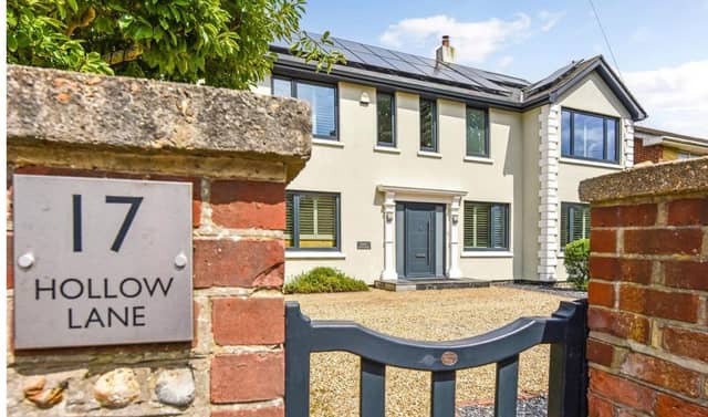 The listing says: "We are proud to present to the sales market, Rhue Cottage. This exceptional five bedroom detached property is situated on Hollow Lane, Hayling Island and offers an abundance of off road parking and some of the best energy efficiency we have seen."