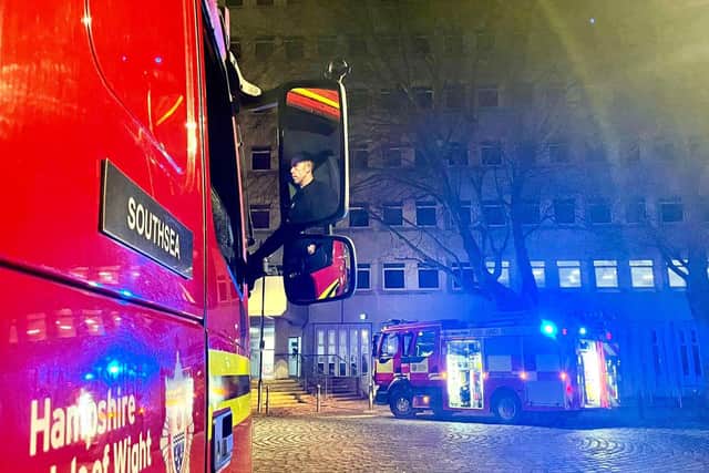 Firefighter outside the university building in King Henry Street where the alert was triggered. Photo: Southsea fire station