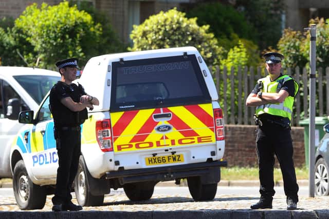 File photo of police out during the lockdown in Wickham. Picture: Sarah Standing (200520-2317)