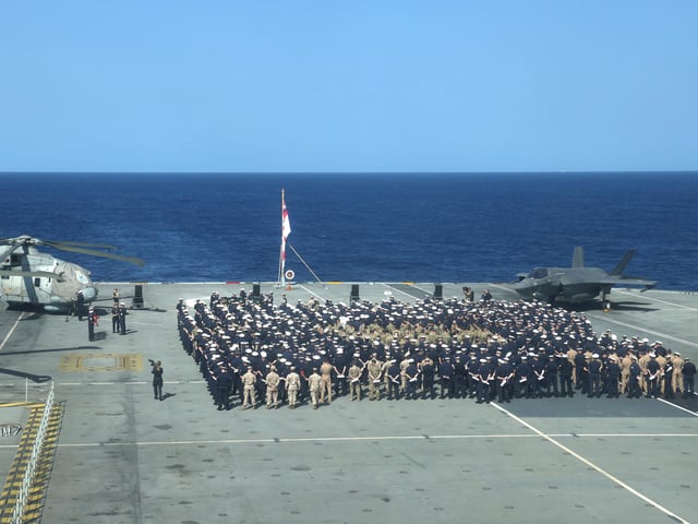 Remembrance Sunday Service on board HMS Queen Elizabeth whilst deployed in 2021.
